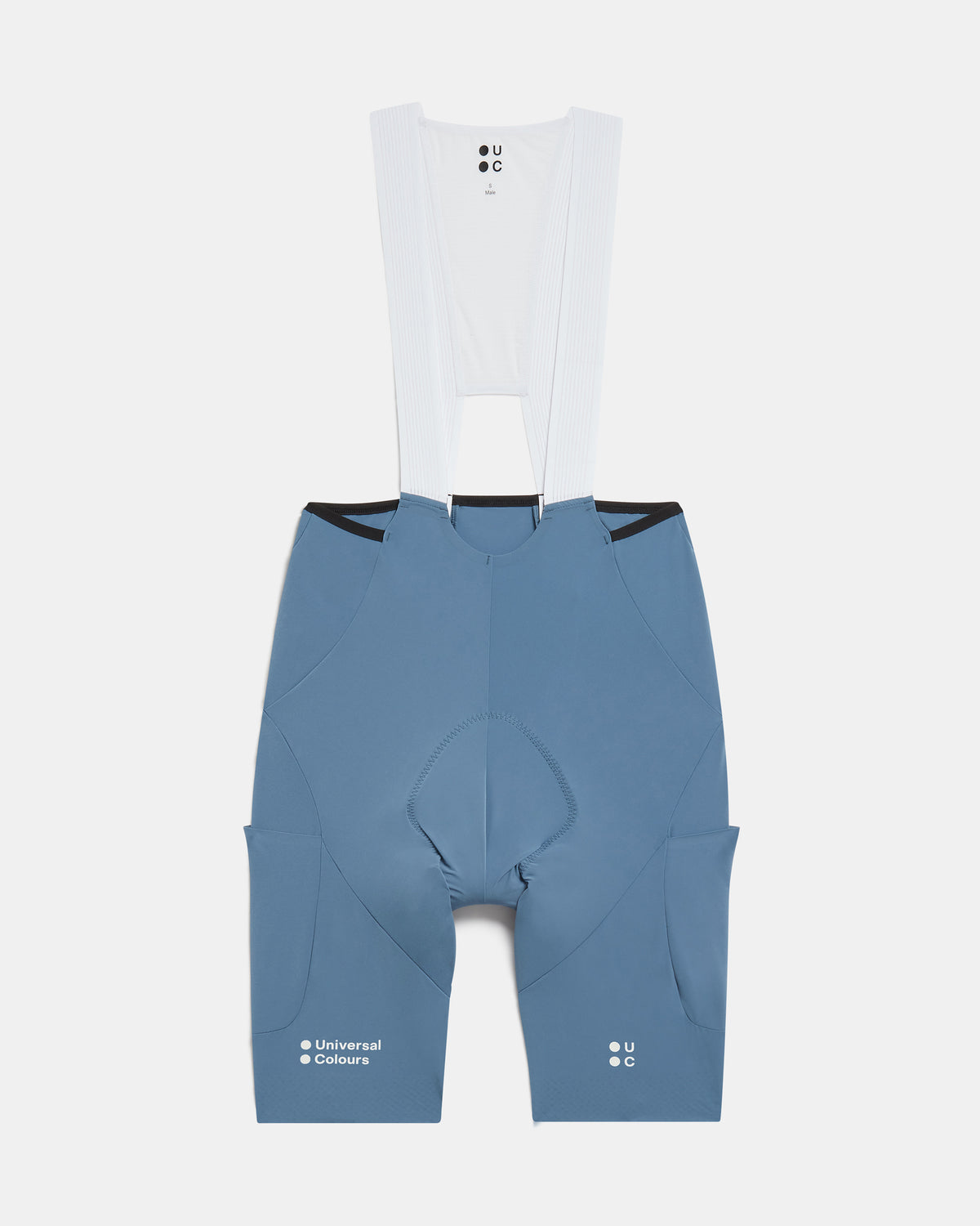 Flatlay of the Men's Chroma Cargo Bib Shorts in Slate Blue: ribbed bib straps, a pocket on each thigh and Universal Colours leg logos.