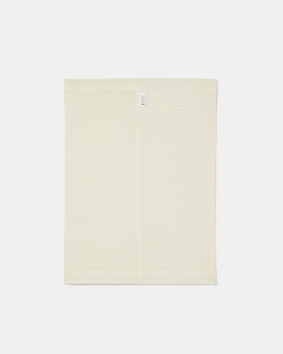 Flatlay of the Polartec Neck Warmer in Off White.