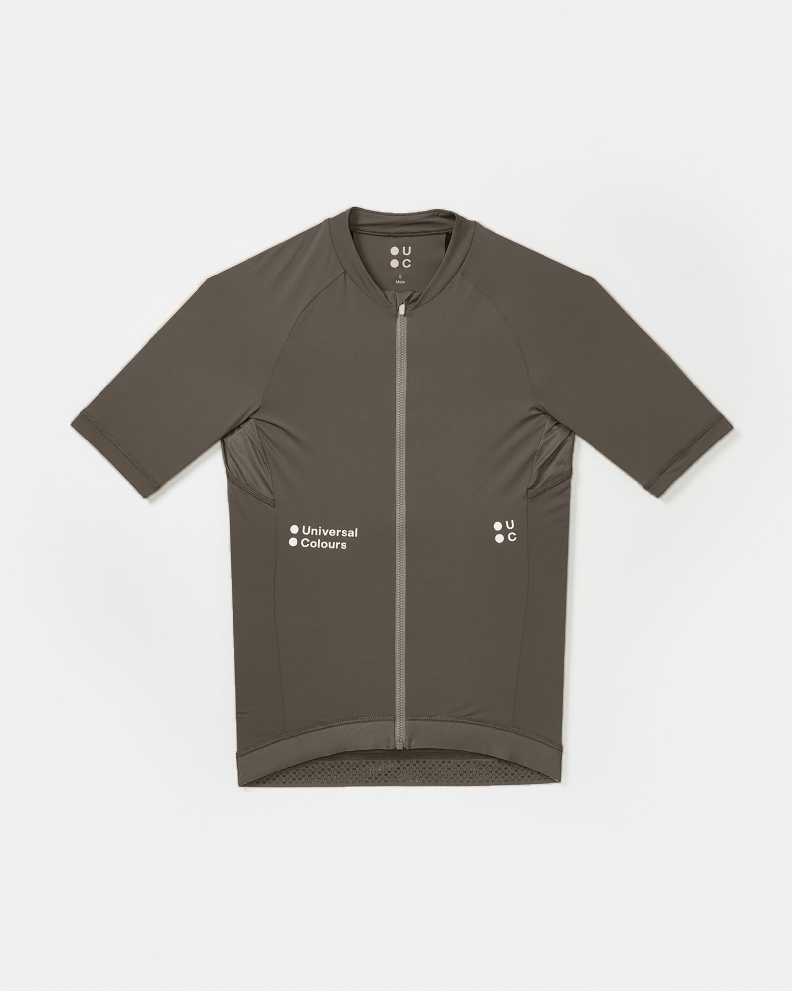 Men's Mono Short Sleeve Jersey in Soft Grey, flatlay: full-length zip, raglan sleeves and tonal UC chest logos.