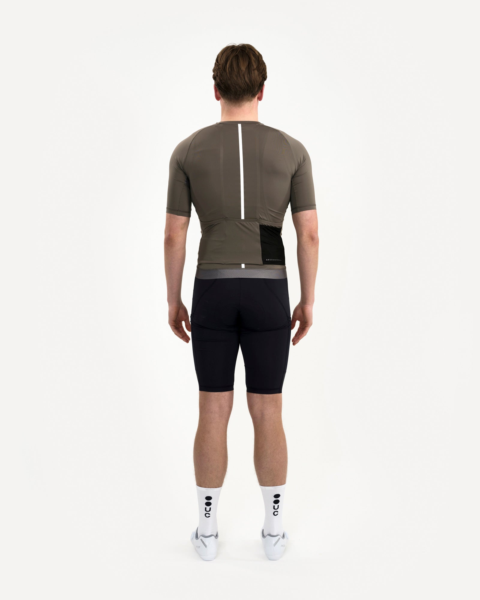 Back view: Men's Mono Short Sleeve Jersey in Soft Grey with reflective spine stripe, mesh rear pocket and dropped hem.
