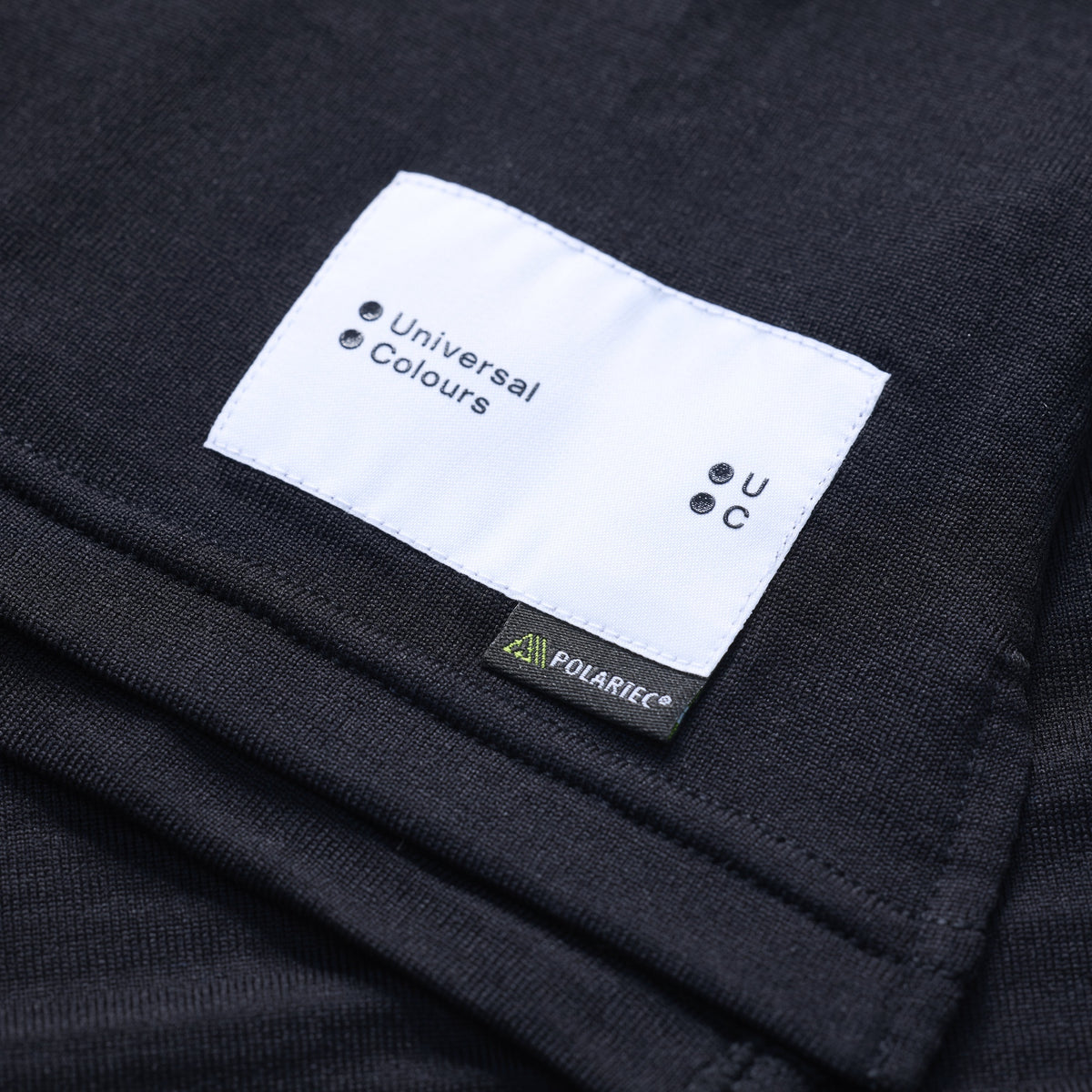 Hem label with the Polartec tag on the Women's Thermal Base Layer in Black.