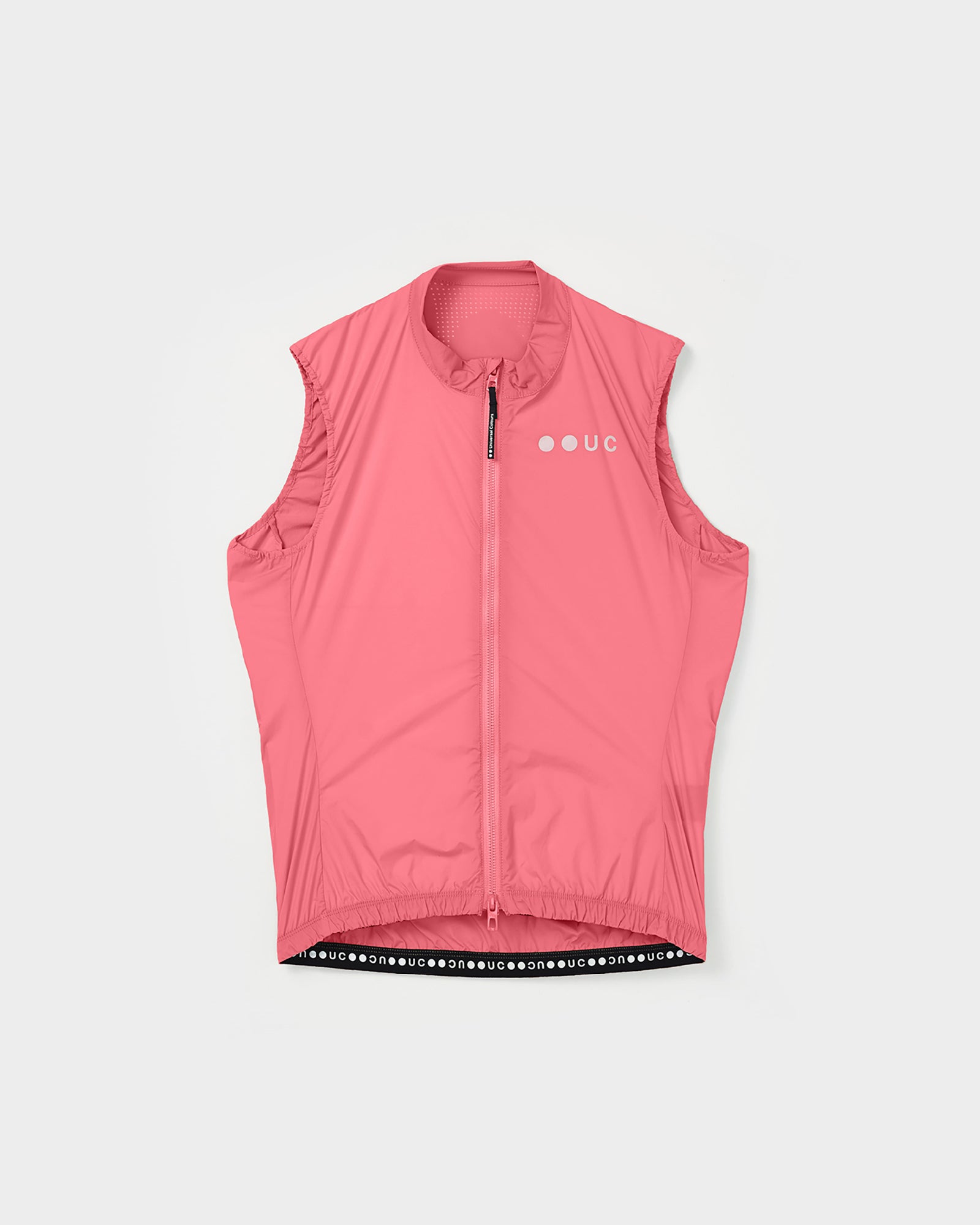 Women's Mono Gilet 2.0 in Washed Pink, flatlay front view: full-length zip, perforated mesh back and tonal UC chest logo.