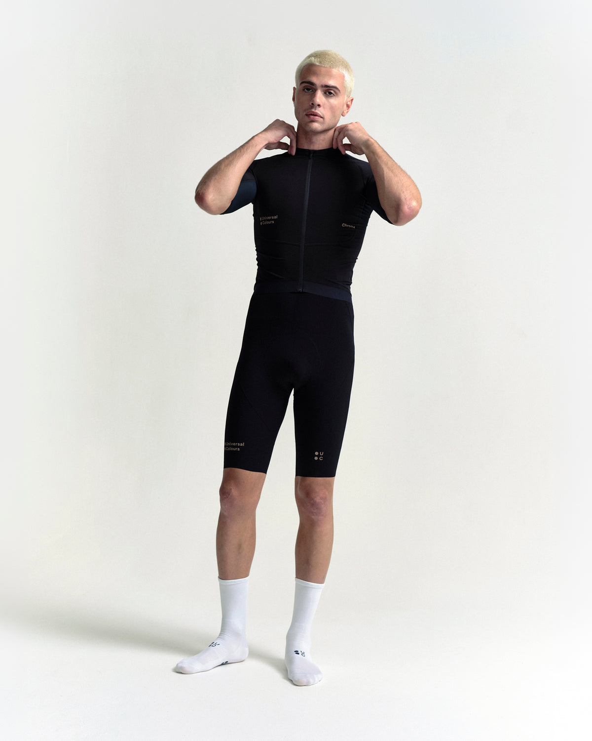 Model wearing the Men's Chroma Bib Shorts in Black/Bronze.