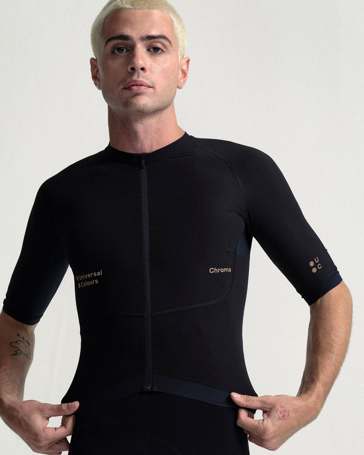 Model wearing the Men's Chroma Bib Shorts in Black/Bronze.