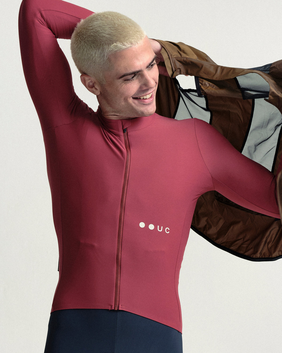 Model wearing the Men's Spectrum Gilet 2.0 in Honey Gold.