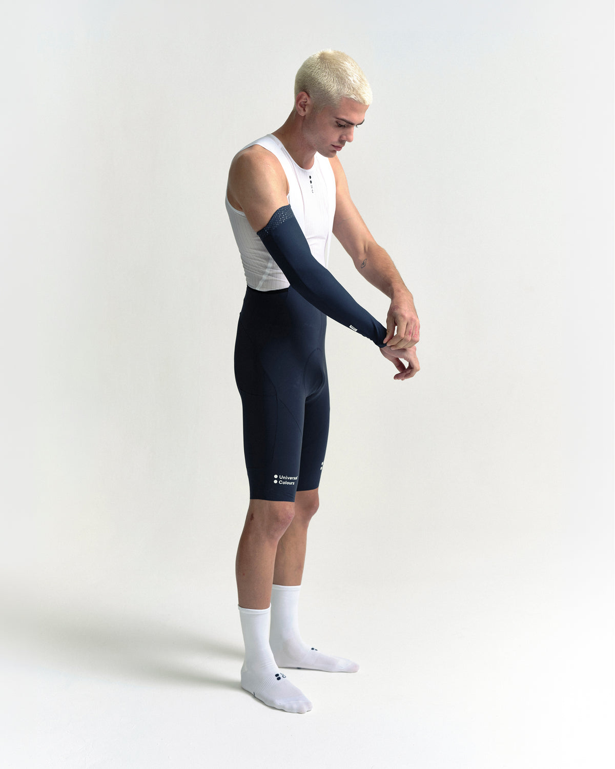 Model wearing the Arm Warmers in Eclipse Navy.