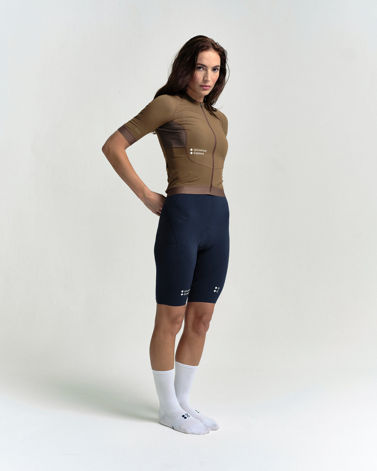 Model wearing the Women's Chroma Short Sleeve Jersey in Golden Brown.