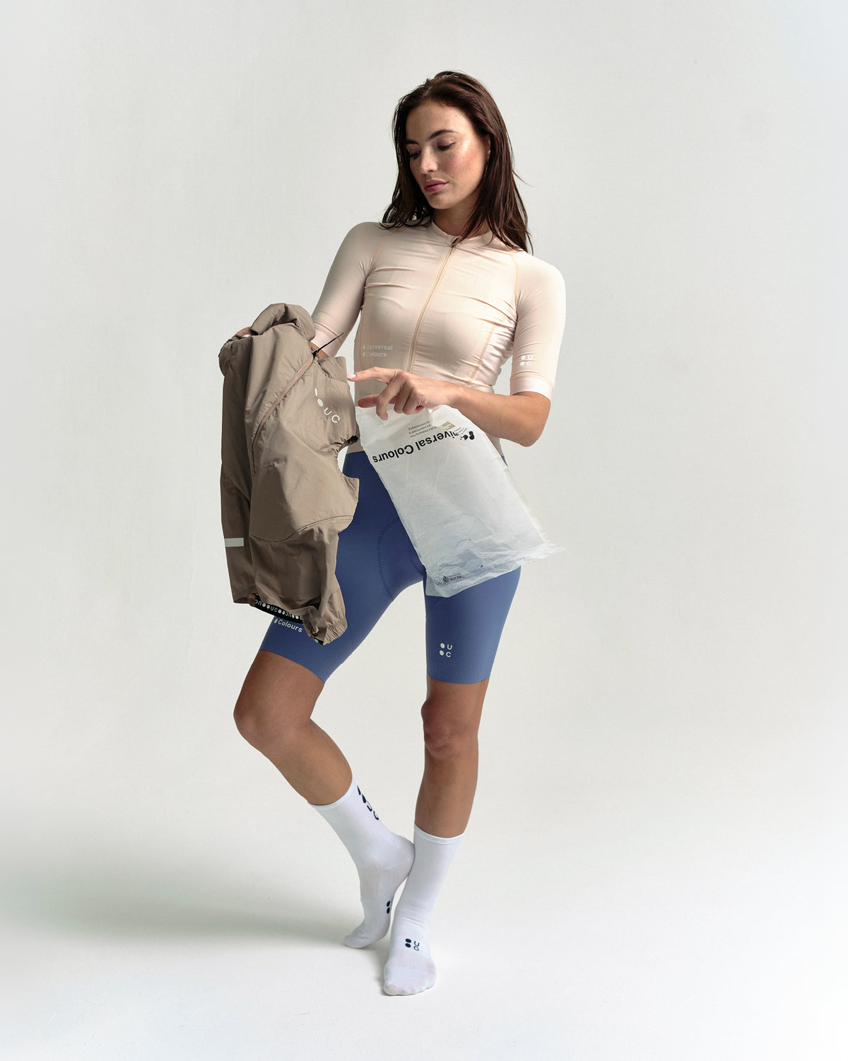Model wearing the Women's Chroma Insulated Gilet in Walnut Brown.