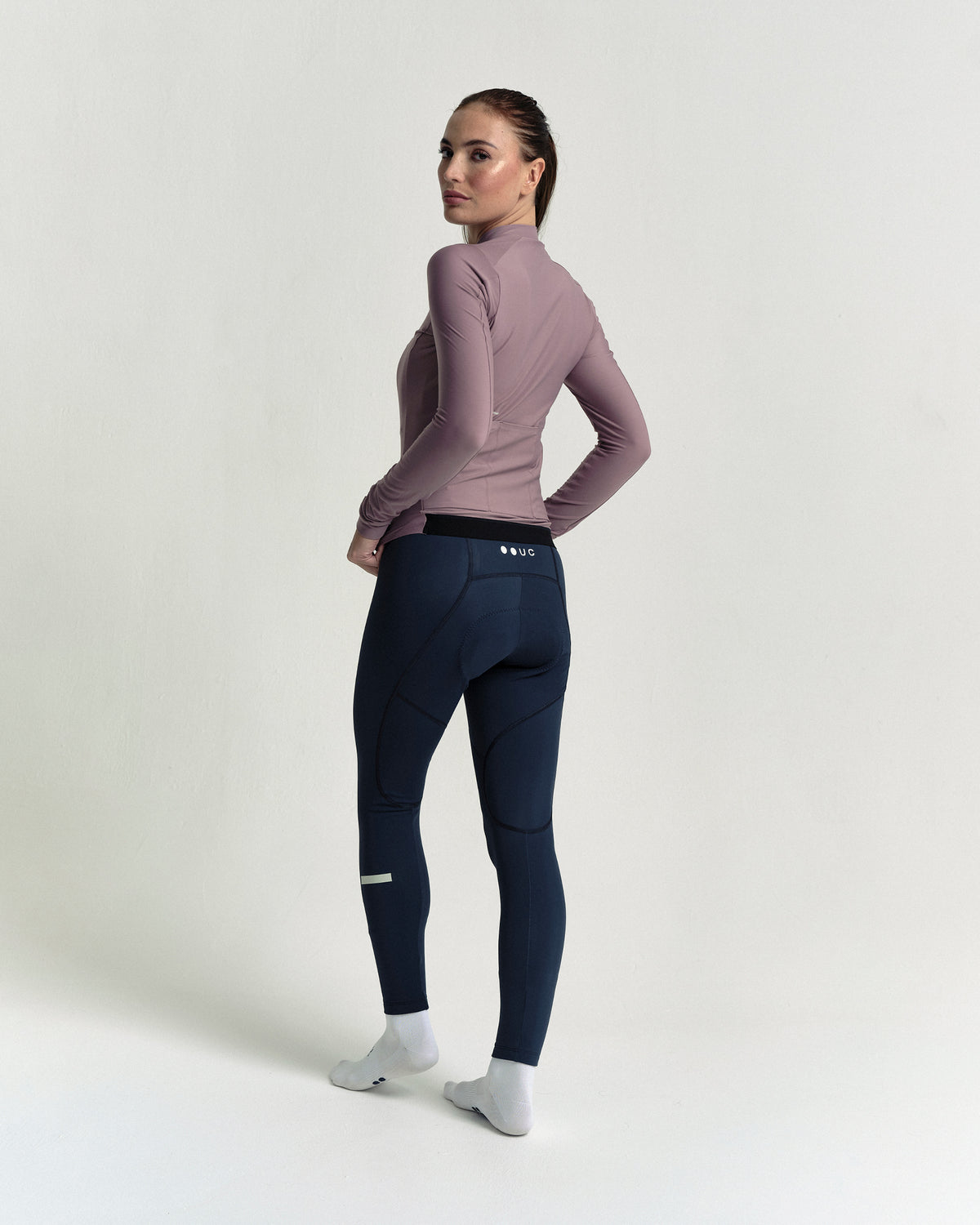 Model wearing the Women's Mono Long Sleeve Jersey in Mauve Mist.