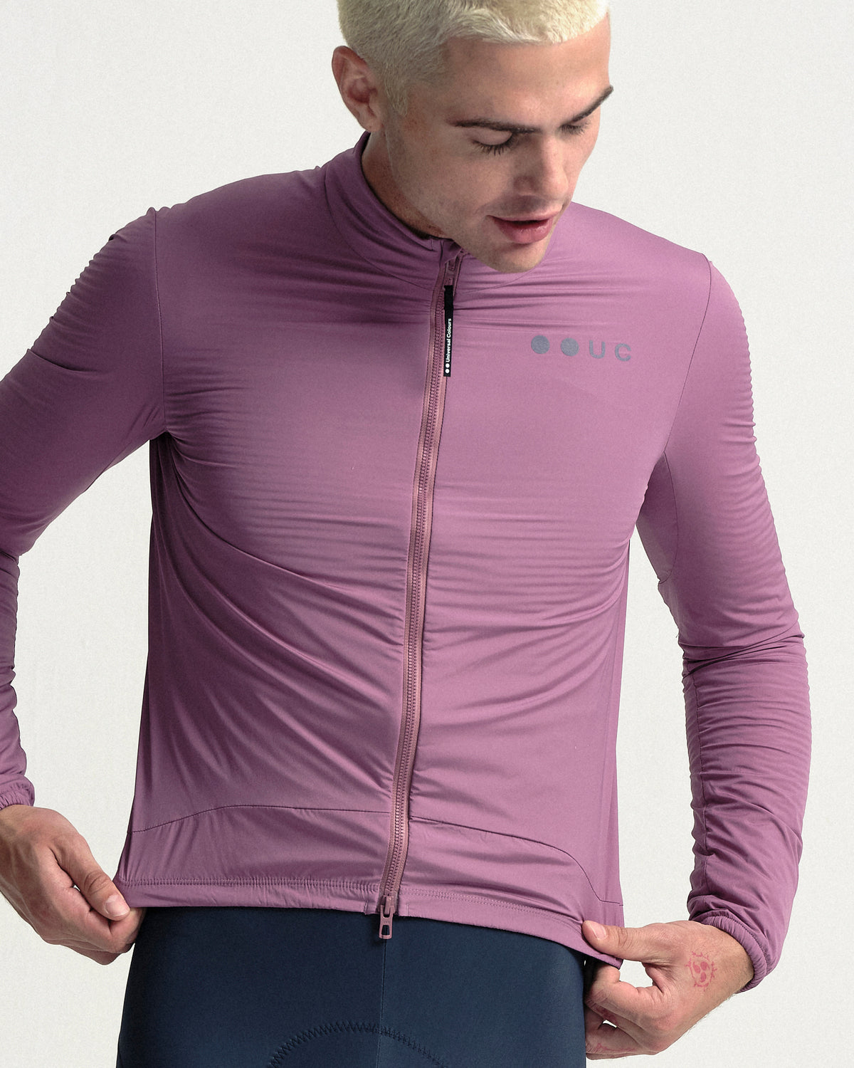 Model wearing the Men's Mono Insulated Jacket in Dusty Rose.
