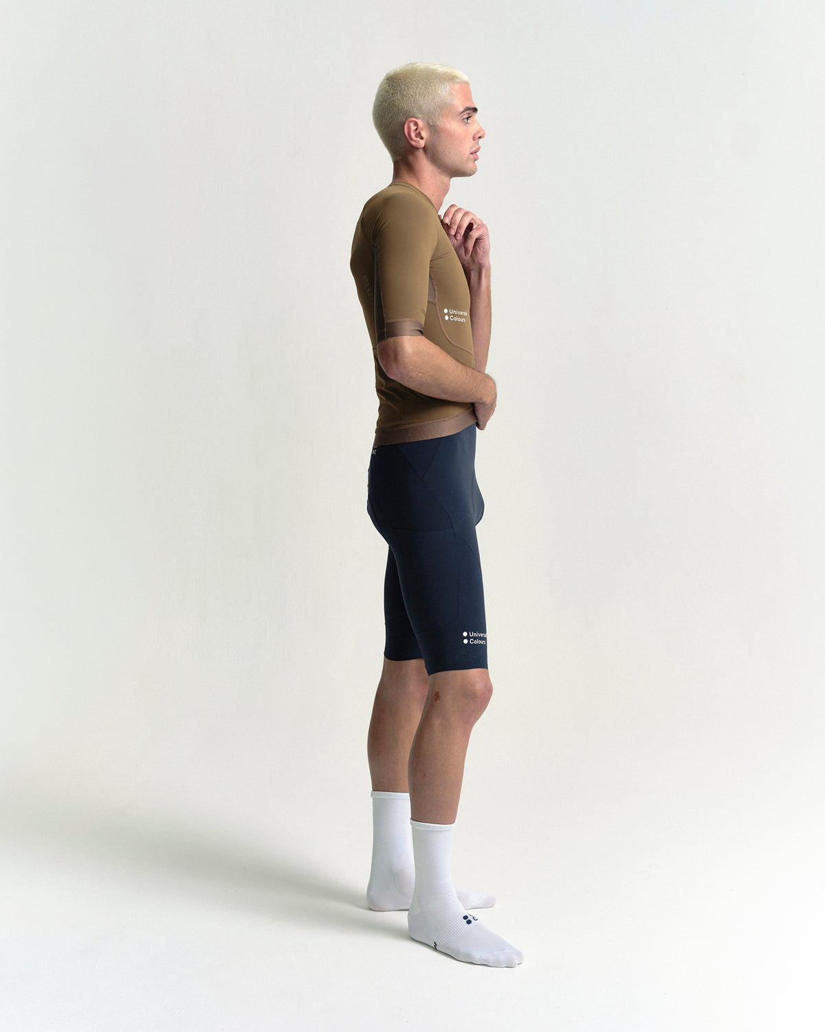 Model wearing the Men's Chroma Short Sleeve Jersey in Golden Brown.