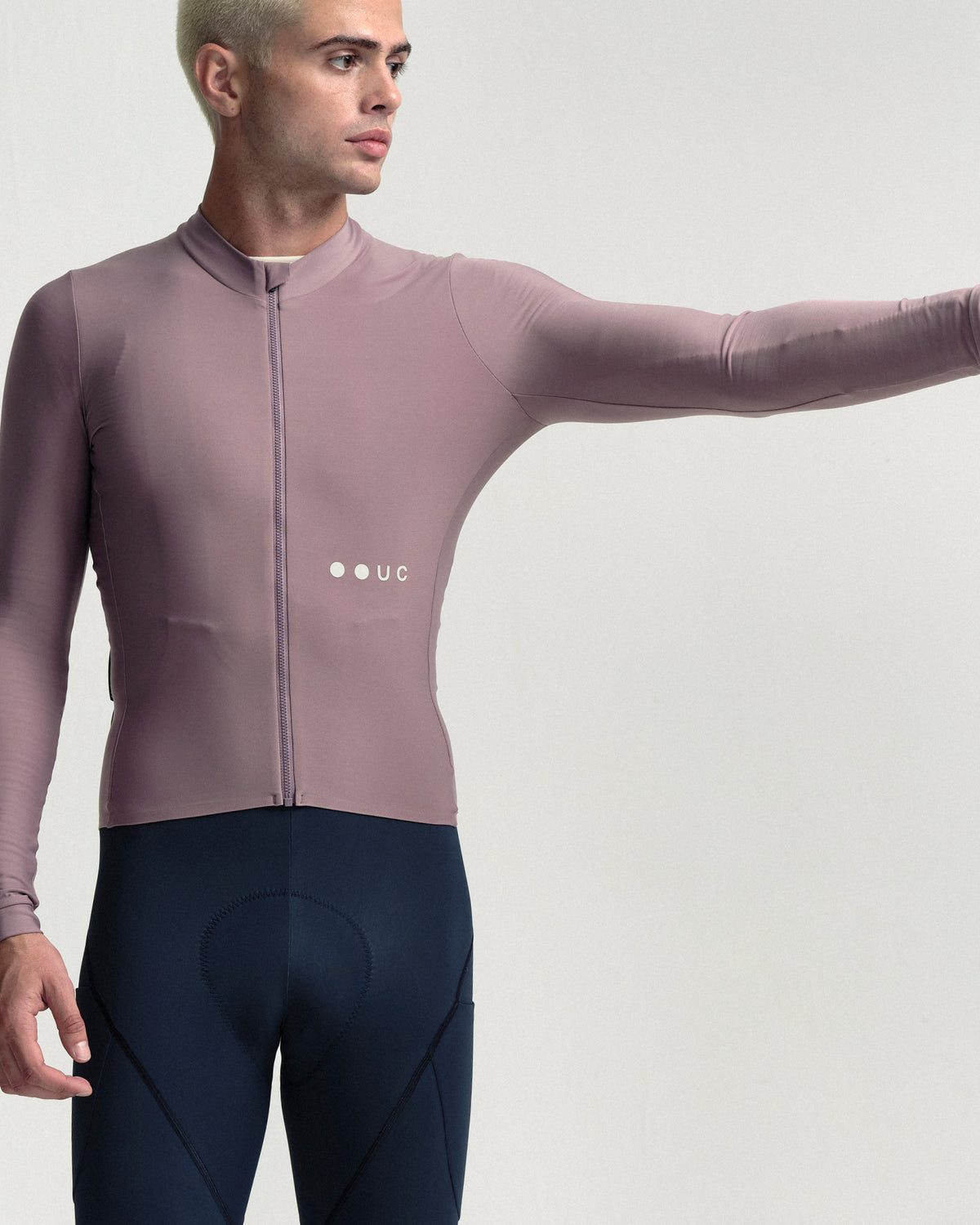 Model wearing the Men's Mono Long Sleeve Jersey in Mauve Mist.