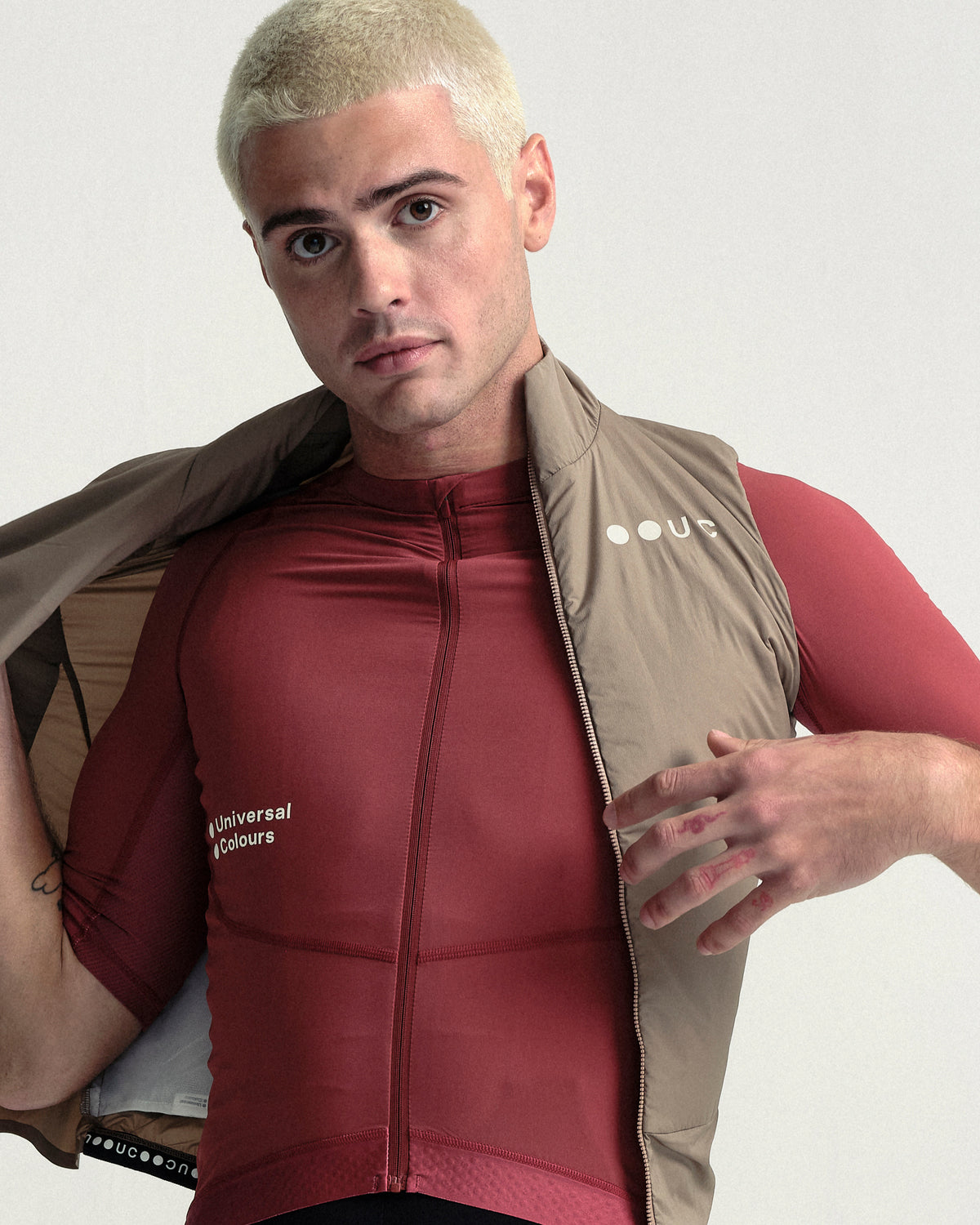 Model wearing the Men's Chroma Insulated Gilet in Walnut Brown.