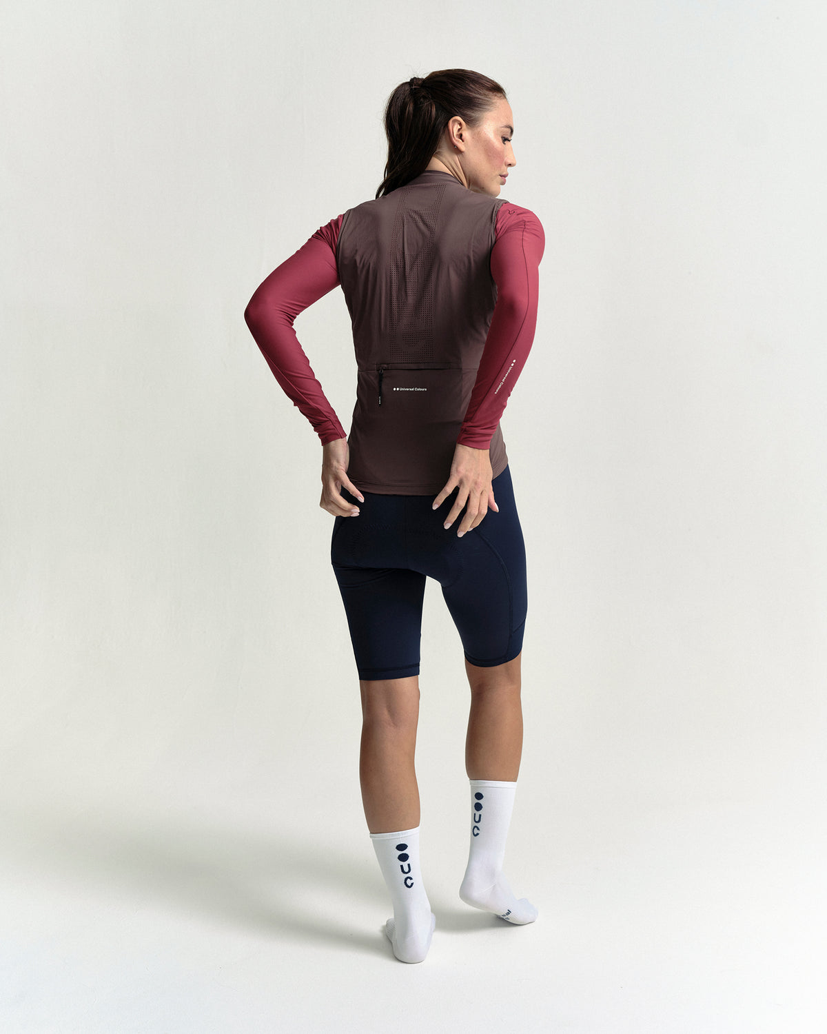 Model wearing the Women's Mono Gilet 2.0 in Stone Brown.