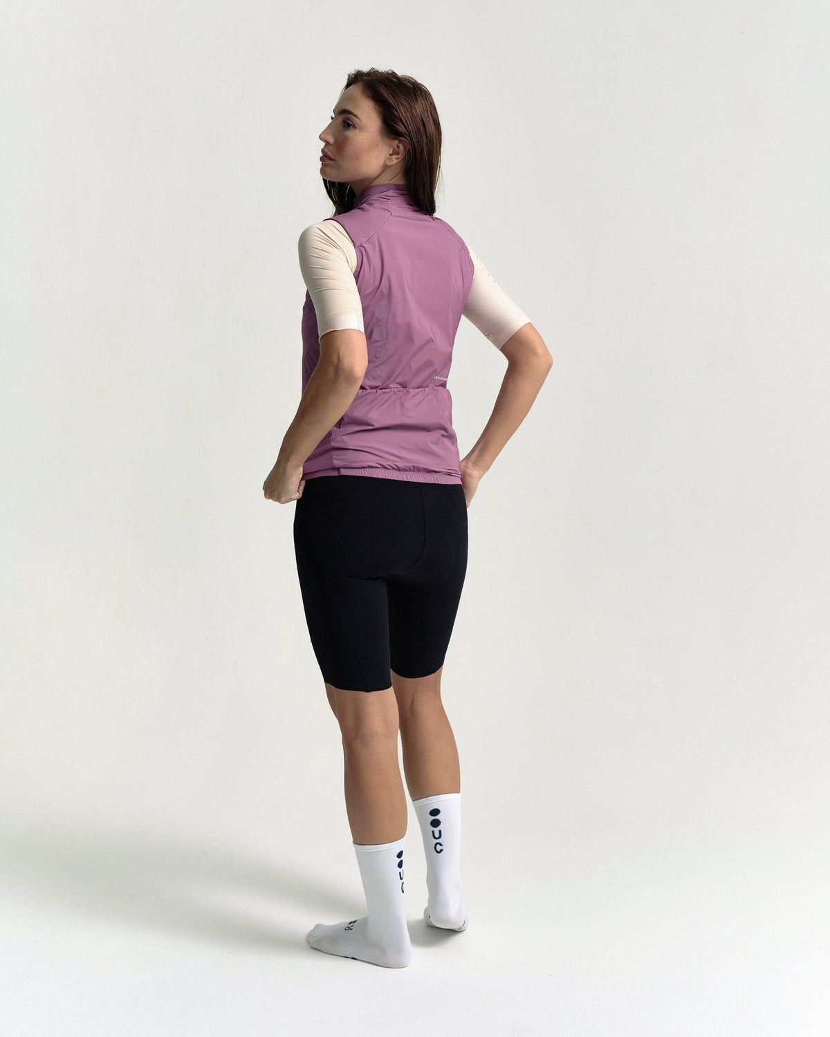 Model wearing the Women's Chroma Insulated Gilet in Dusty Rose.