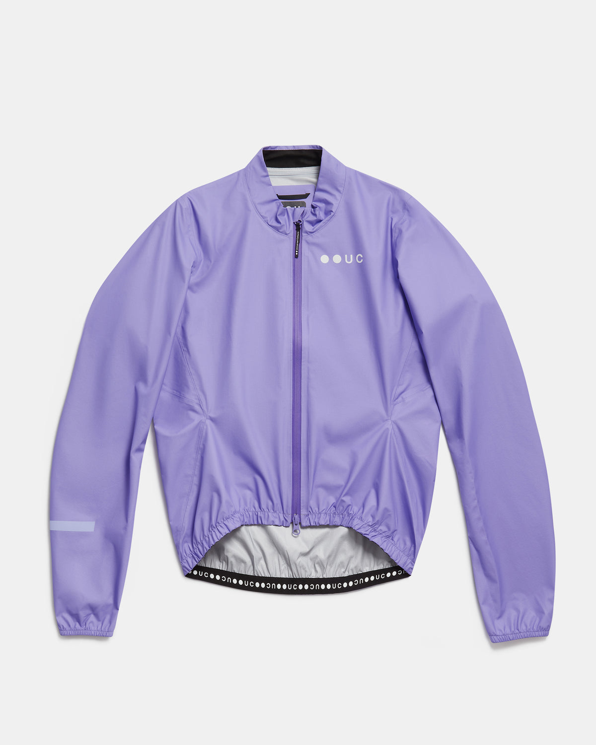 Flatlay of the Men's Mono Rain Jacket in Cloud Lilac: ripstop shell, full-length zip and UC chest logo.