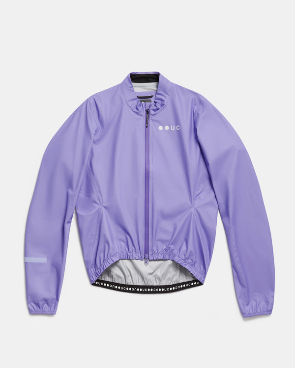Flatlay of the Men's Mono Rain Jacket in Cloud Lilac: ripstop shell, full-length zip and UC chest logo.
