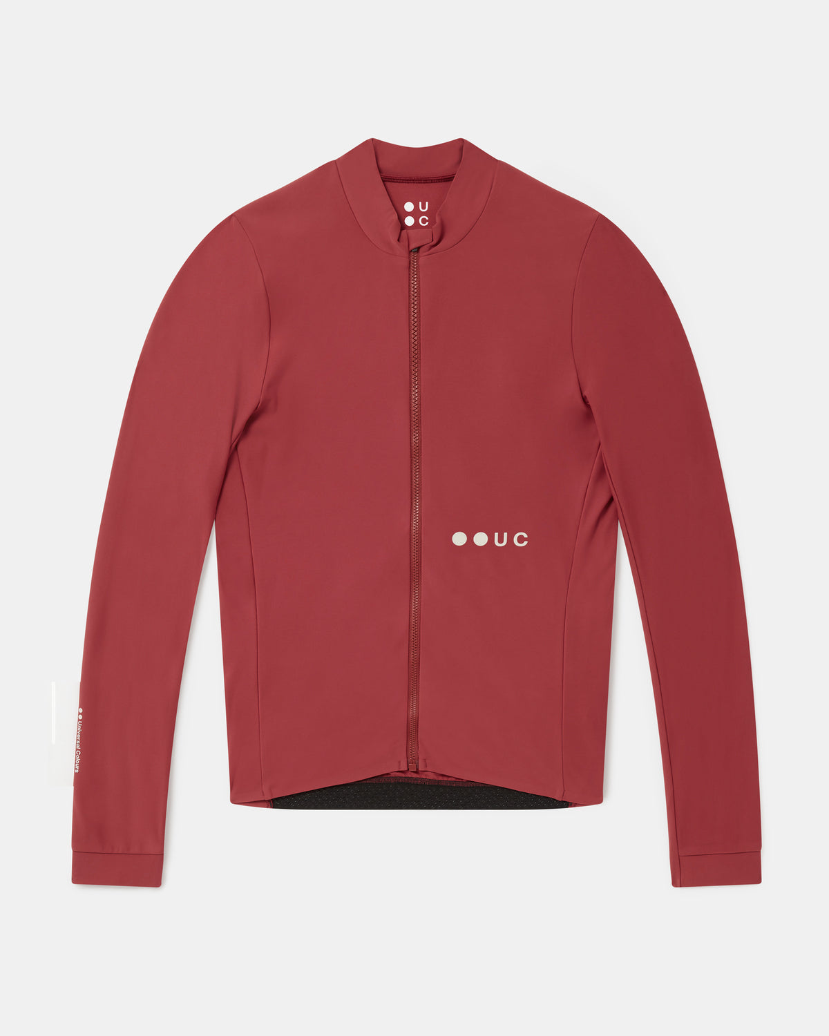 Flatlay of the Men's Mono Long Sleeve Jersey in Apple Red: mock collar, full-length zip and UC logo.