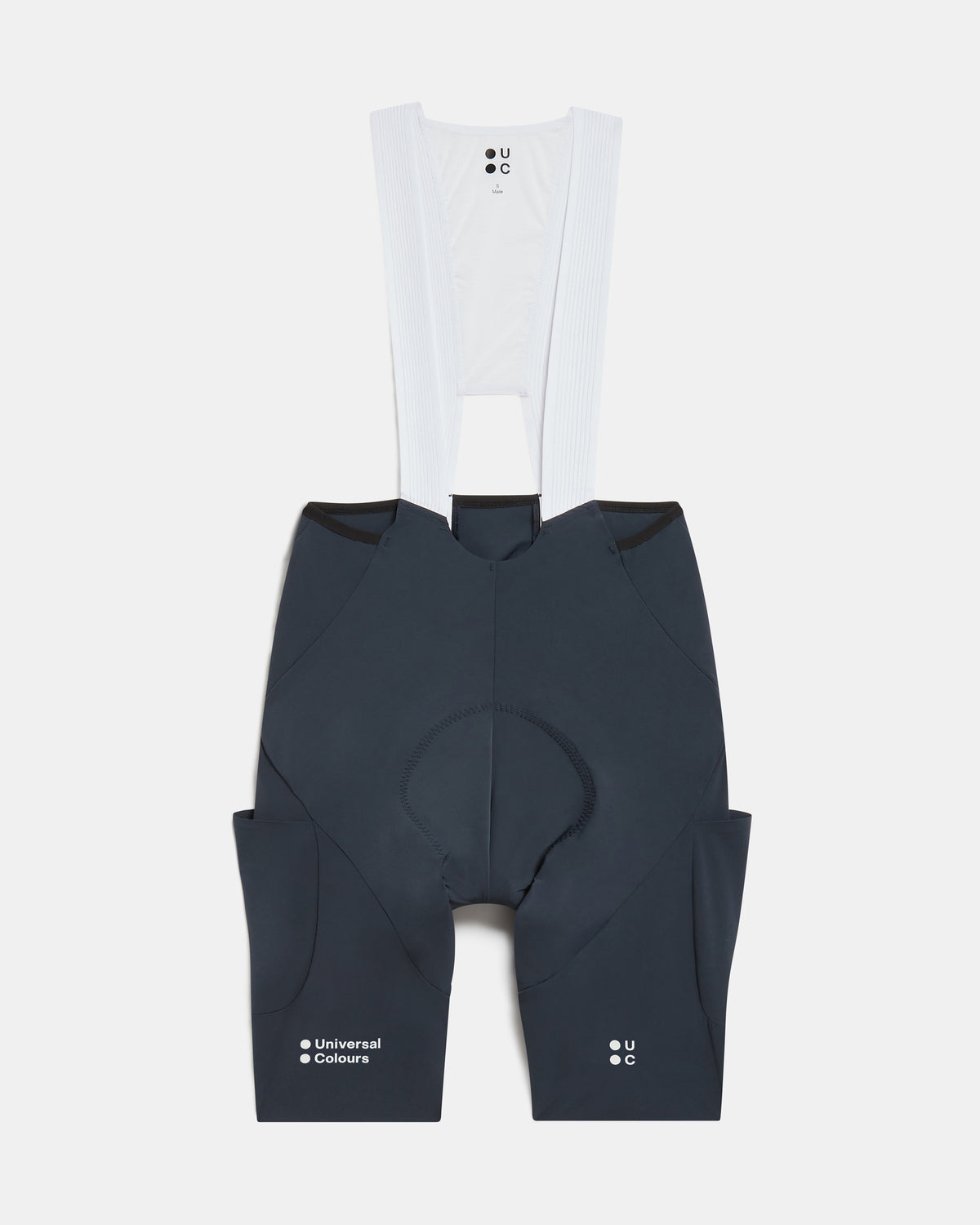 Flatlay of the Men's Chroma Cargo Bib Shorts in Navy Blue: ribbed bib straps, a pocket on each thigh and Universal Colours leg logos.