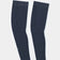 Flatlay of the UC Leg Warmers in Eclipse Navy: silicone gripper dots at the top hem and UC wordmark near the cuff.