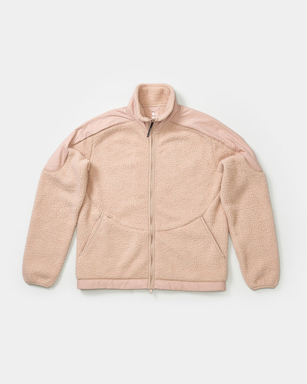 Flatlay of the Unisex Fleece Jacket in Almond Beige, sherpa body with smooth nylon shoulder panels and full-length zip.