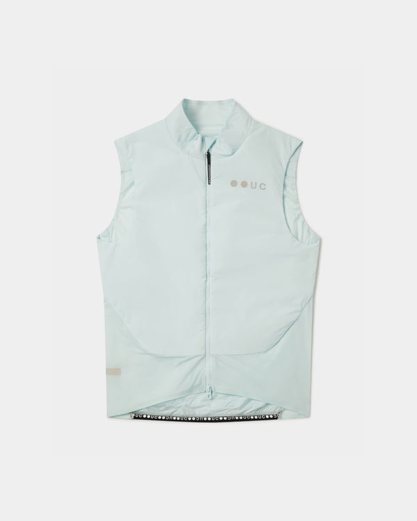 Flatlay: Unisex Chroma Insulated Gilet in Misty Blue, high collar, full-length zip and tonal UC chest logo.