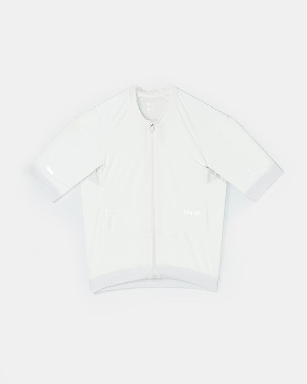 Flatlay: Men's Chroma Short Sleeve Jersey in Off White, full zip with tonal Universal Colours and Chroma wordmarks.