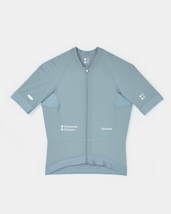 Women's Chroma Short Sleeve Jersey in Sky Blue flatlay: full-length zip, side mesh panels and tonal UC chest wordmark.