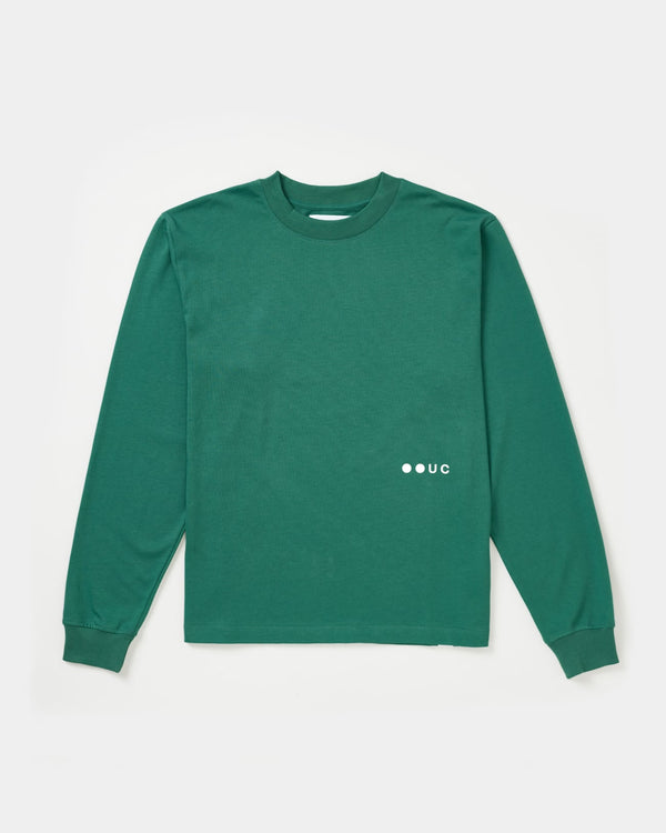 Flatlay front of the Unisex Long Sleeve Tee in Bottle Green, ribbed crew collar and cuffs, white UC chest wordmark.