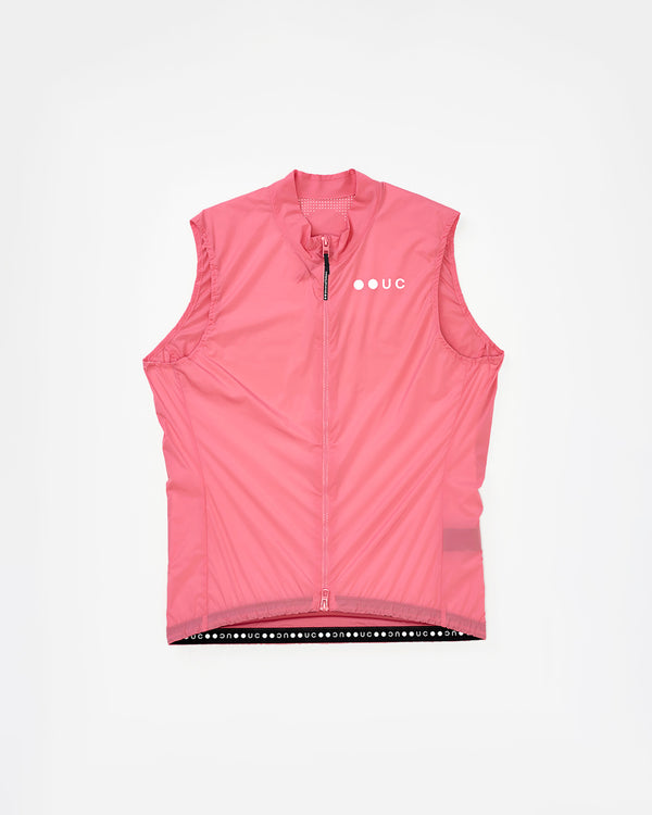 Men's Mono Gilet 2.0 in Washed Pink, flatlay front view: lightweight wind shell with high collar and tonal UC chest logo.