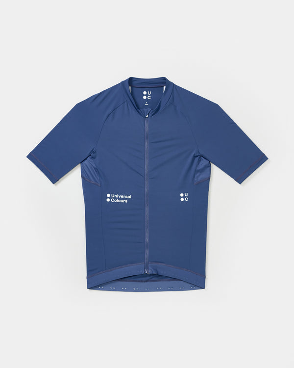 Flatlay of the Men's Mono Short Sleeve Jersey in French Blue: mock collar, full-length zip and silicone gripper hem.