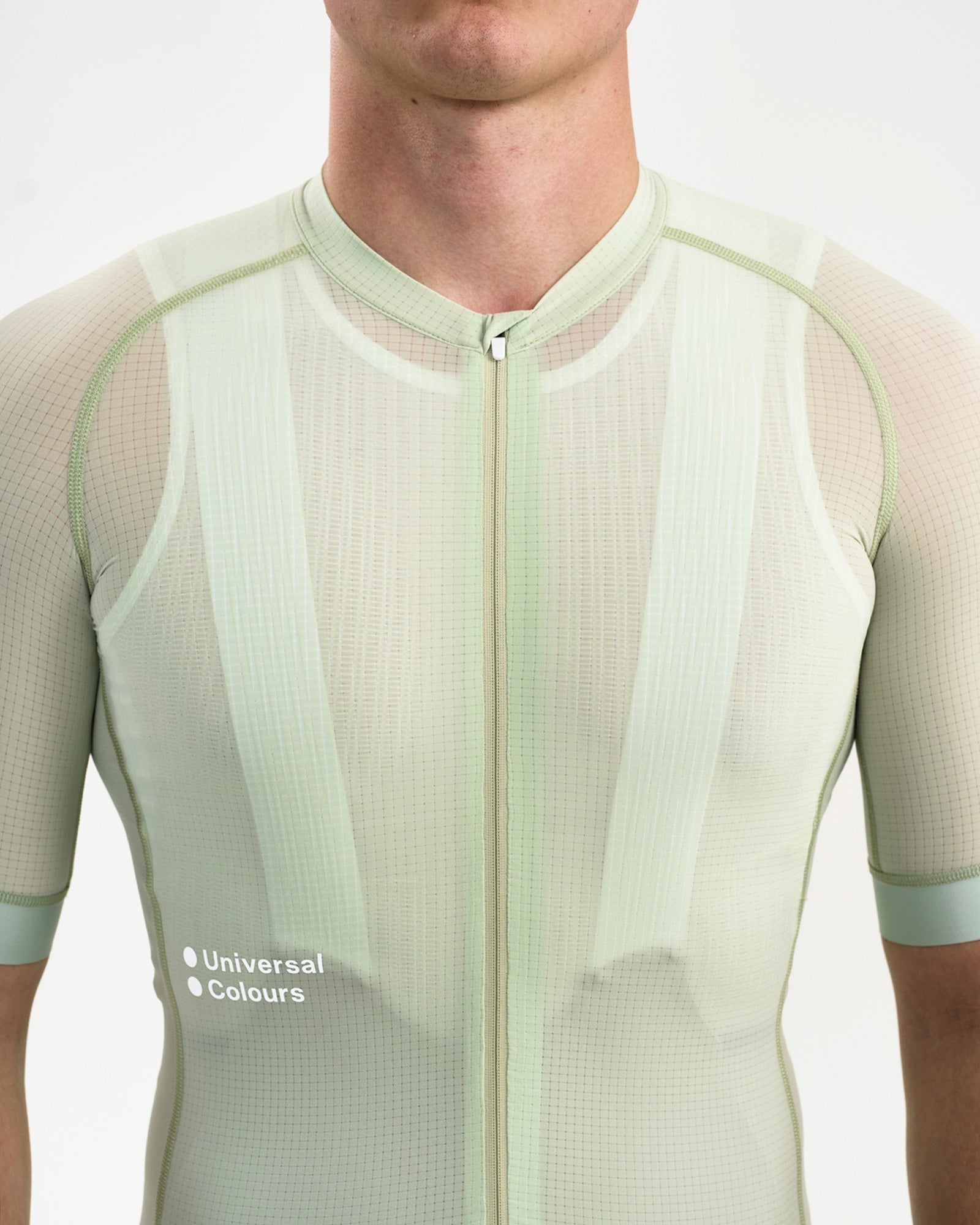 Front zip and collar close-up: full-length zip and sheer ripstop chest panel of the Bower Green Chroma Jersey.