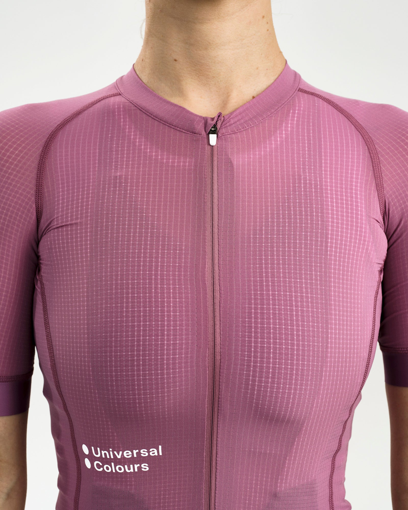 Close-up of the ripstop grid fabric, full-length zip and low collar on the Women's Chroma Light Jersey in Dusty Lilac.