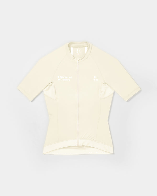 Flatlay of the Women's Mono Short Sleeve Jersey in Tampered White: high collar, full-length zip and tonal UC chest logos.