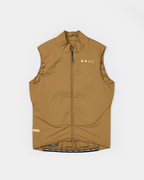 Flatlay: Unisex Chroma Insulated Gilet in Golden Beige, full-length zip, mock collar and tonal UC chest logo.