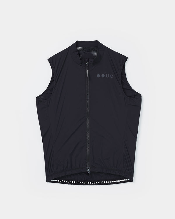 Flatlay of the Women's Mono Gilet 2.0 in Bamboo Black: mock collar, full-length zip and tonal UC chest logo.
