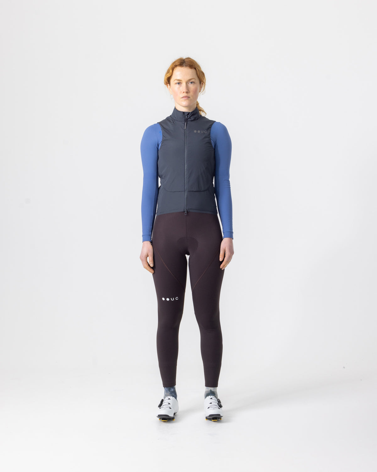 Model in the Women's Chroma Insulated Gilet in Slate Grey, full-length view.