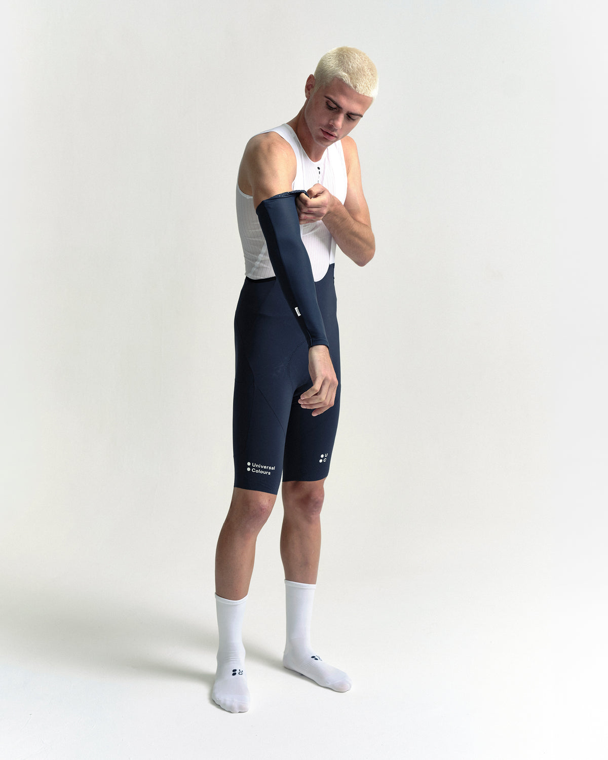Model in the Arm Warmers in Eclipse Navy, full-length view.