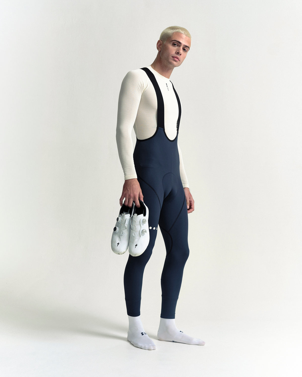 Model in the Men's Thermal Base Layer in Off White, full-length view.