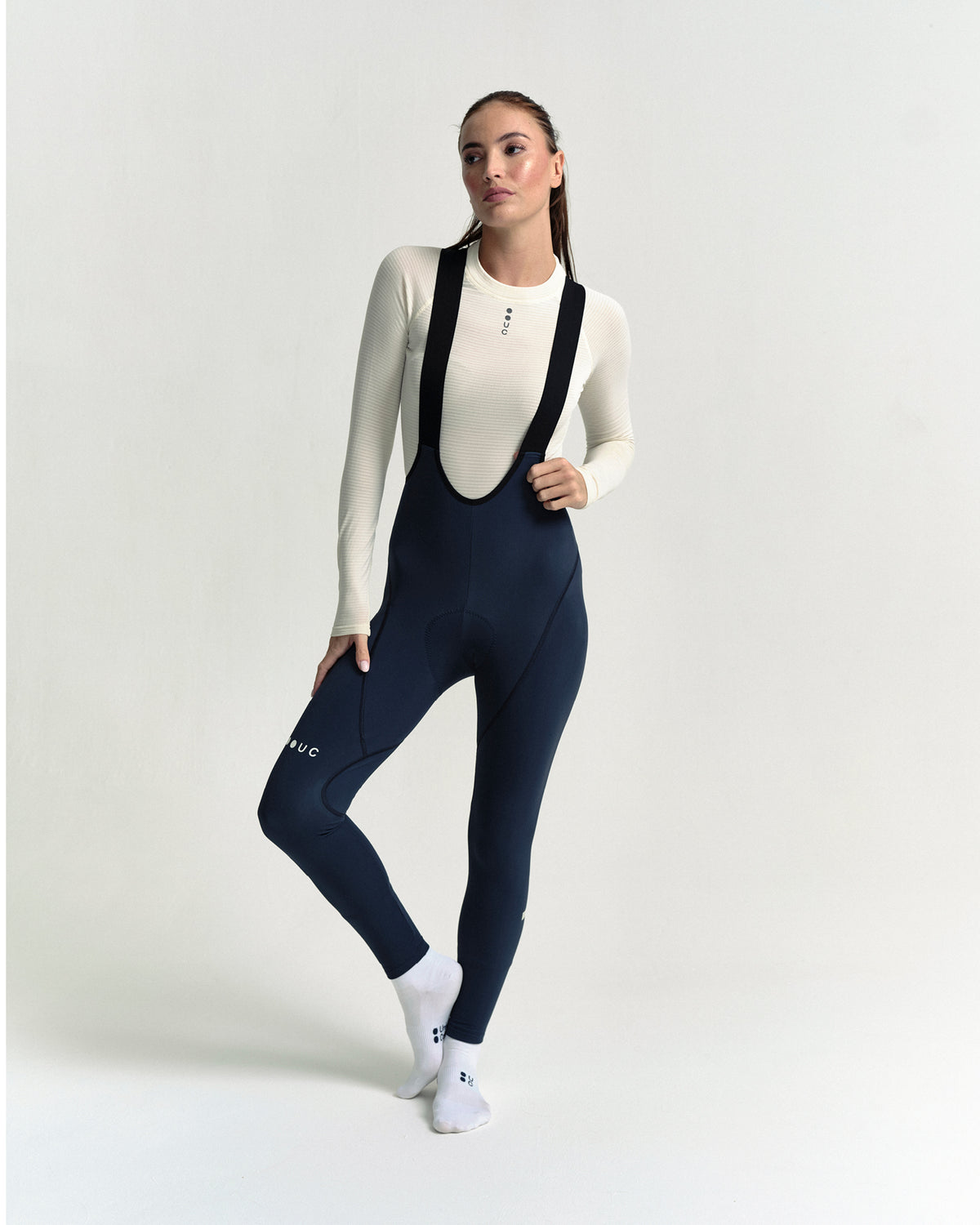Model in the Women's Thermal Base Layer in Off White, full-length view.