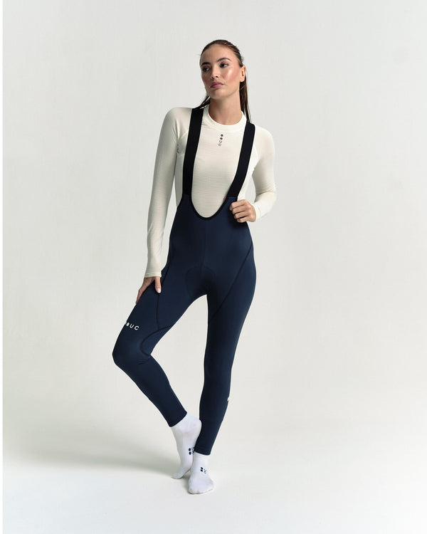 Model in the Women's Thermal Base Layer in Off White, full-length view.