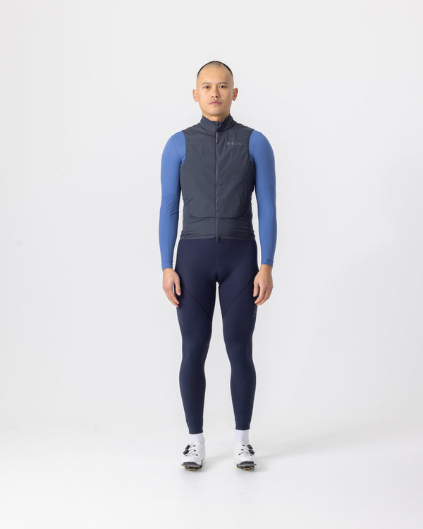 Model in the Men's Chroma Insulated Gilet in Slate Grey, full-length view.