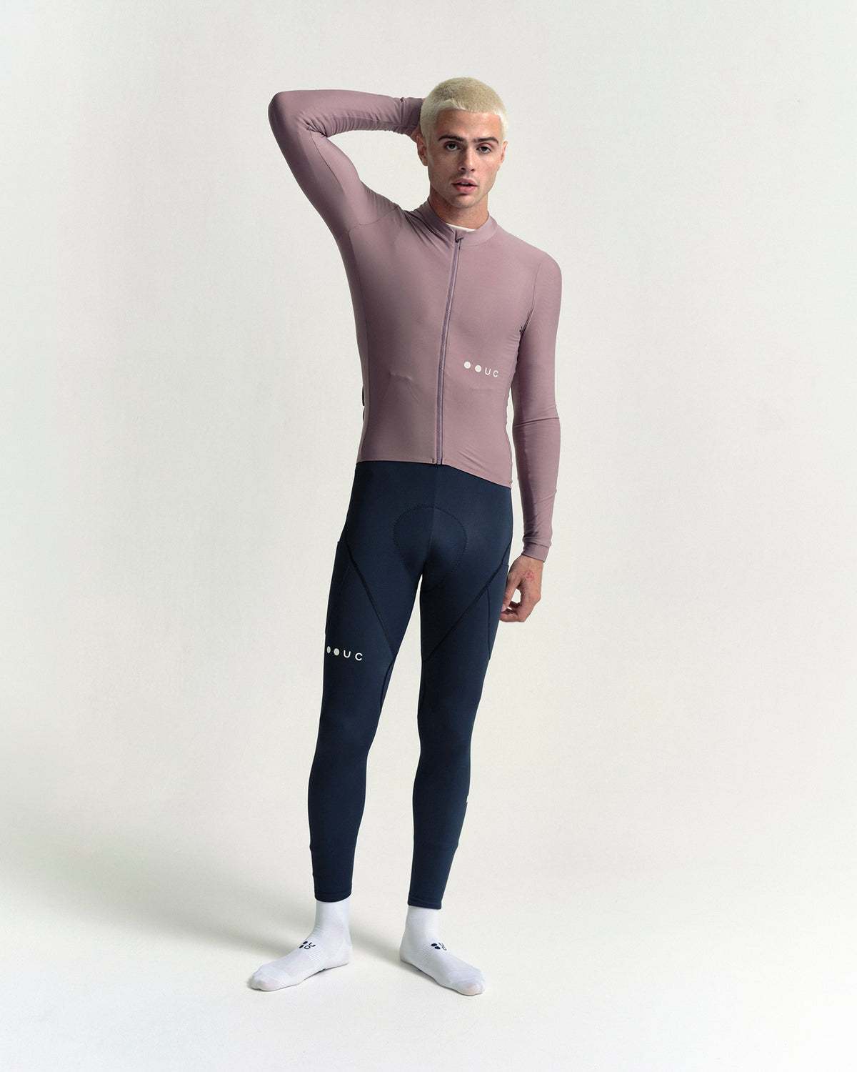 Model wearing the Men's Mono Long Sleeve Jersey in Mauve Mist.