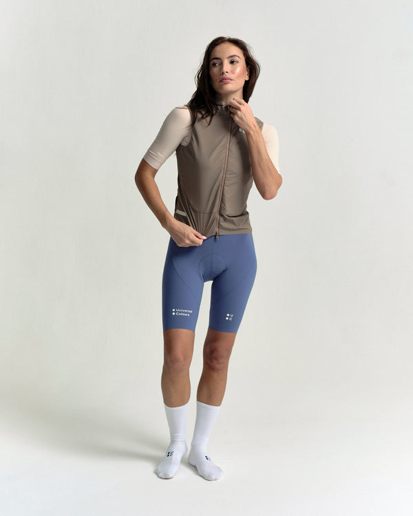 Model in the Women's Chroma Insulated Gilet in Walnut Brown, full-length view.