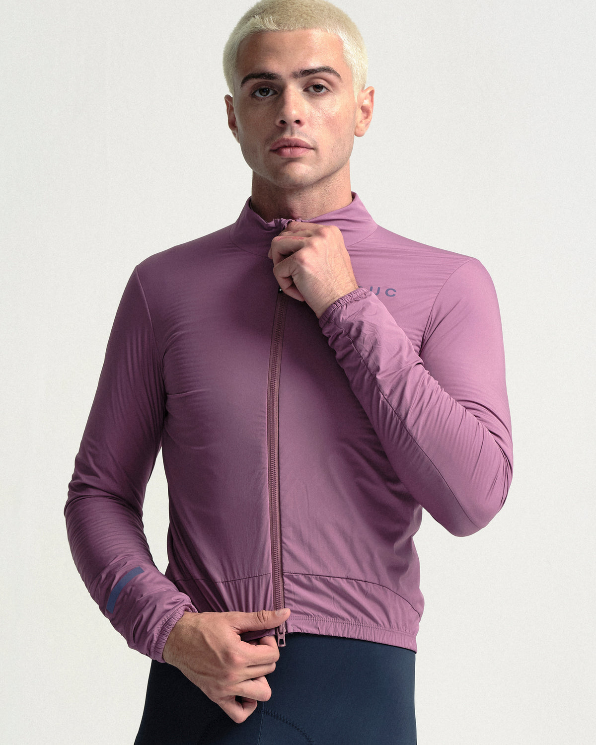 Model wearing the Men's Mono Insulated Jacket in Dusty Rose.