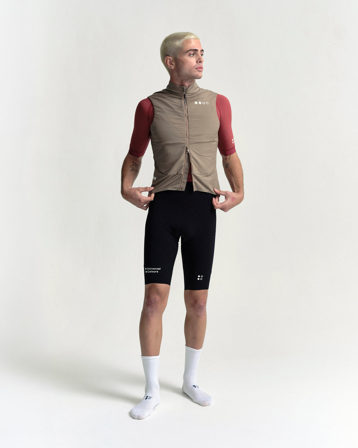 Model wearing the Men's Chroma Insulated Gilet in Walnut Brown.