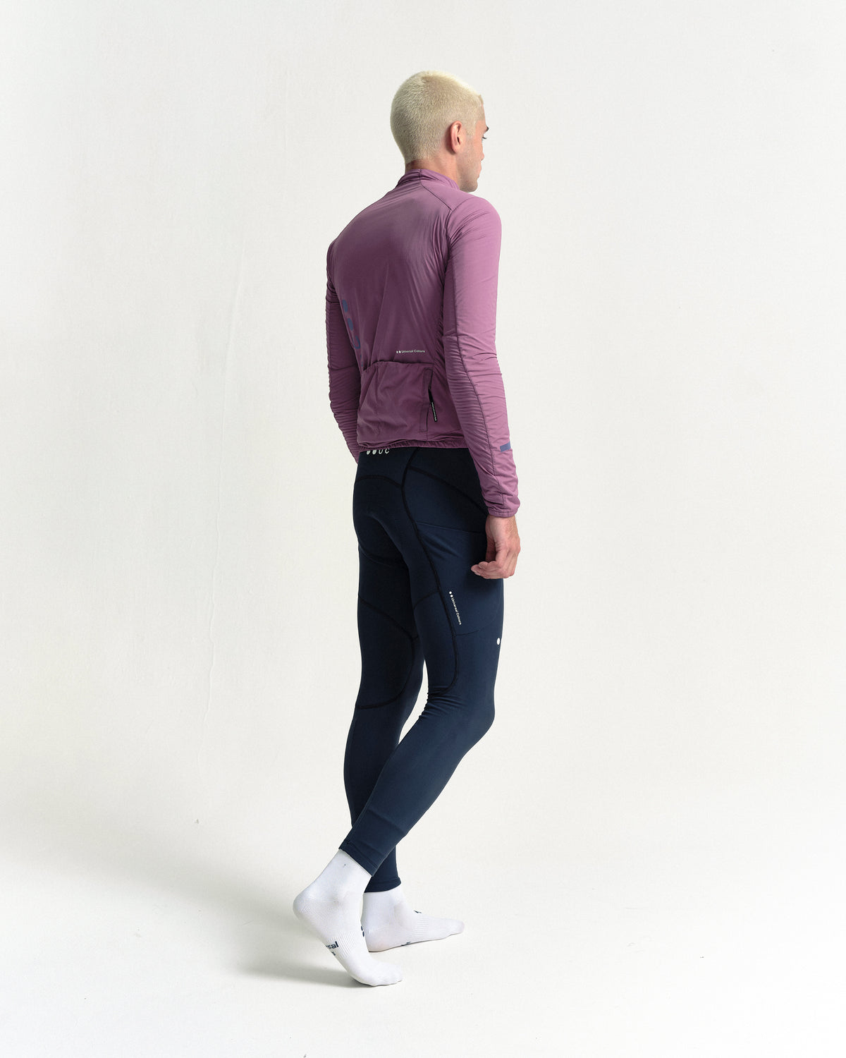 Model wearing the Men's Mono Insulated Jacket in Dusty Rose.