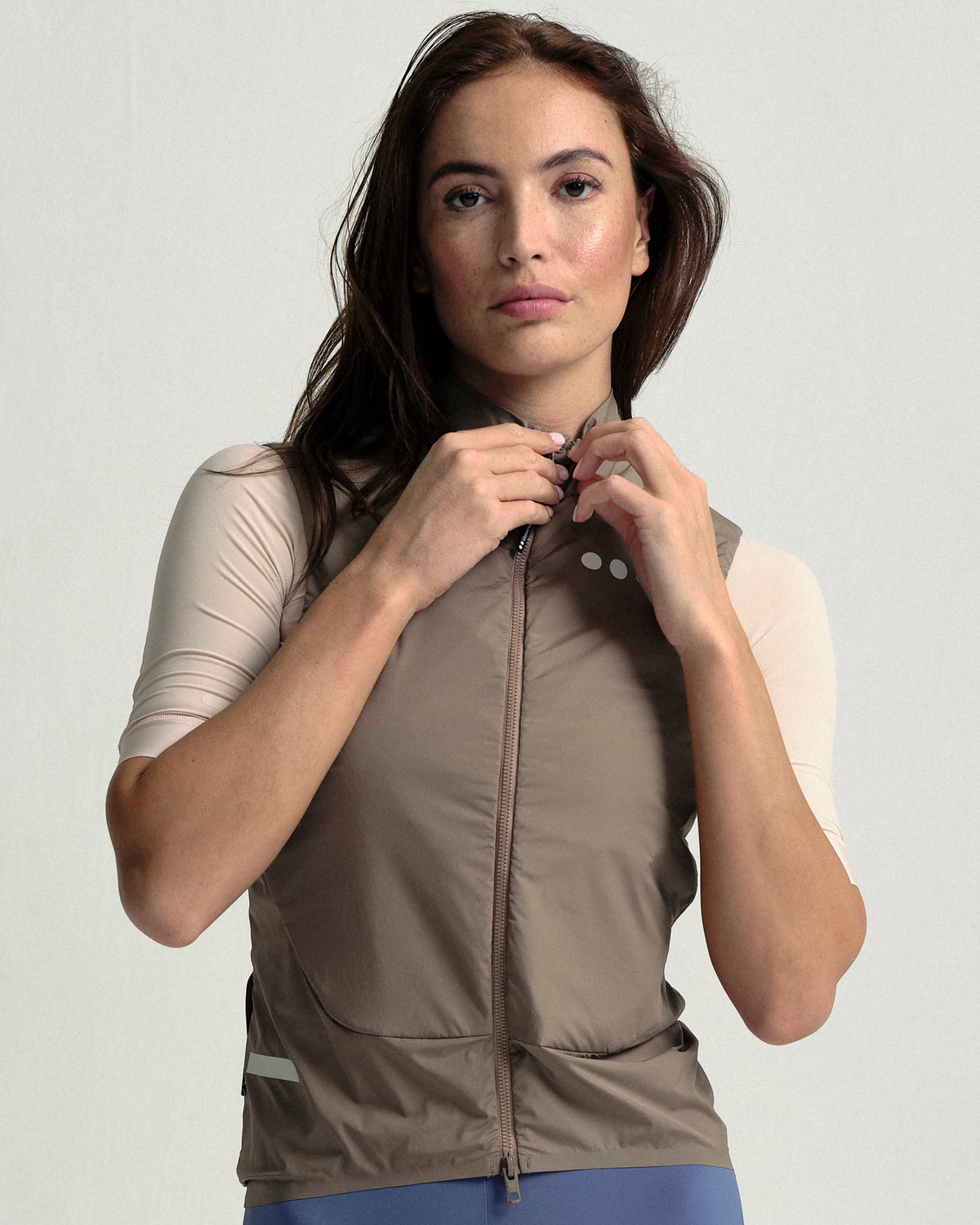 Model wearing the Women's Chroma Insulated Gilet in Walnut Brown.
