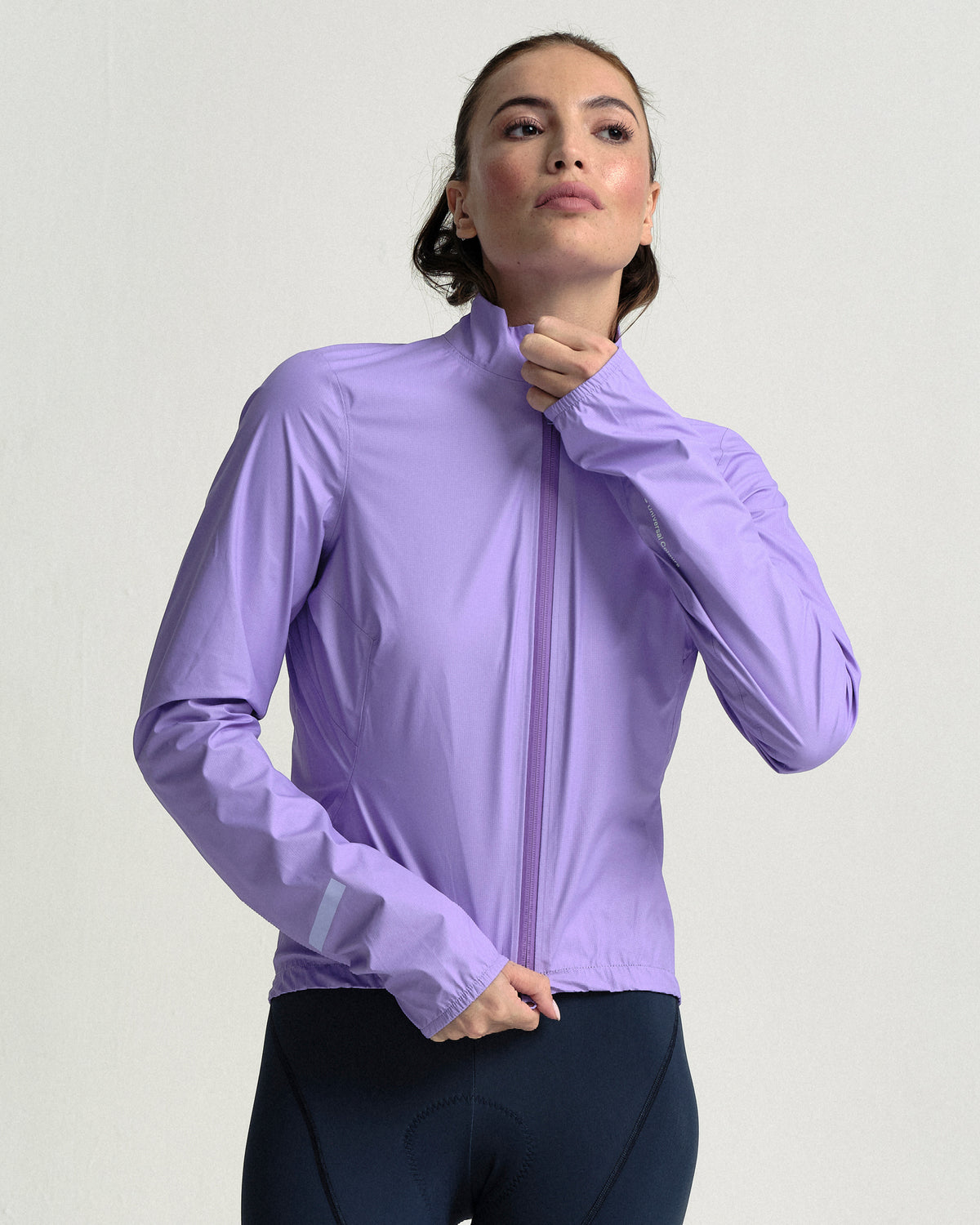 Model in the Women's Mono Rain Jacket in Cloud Lilac, close front view.