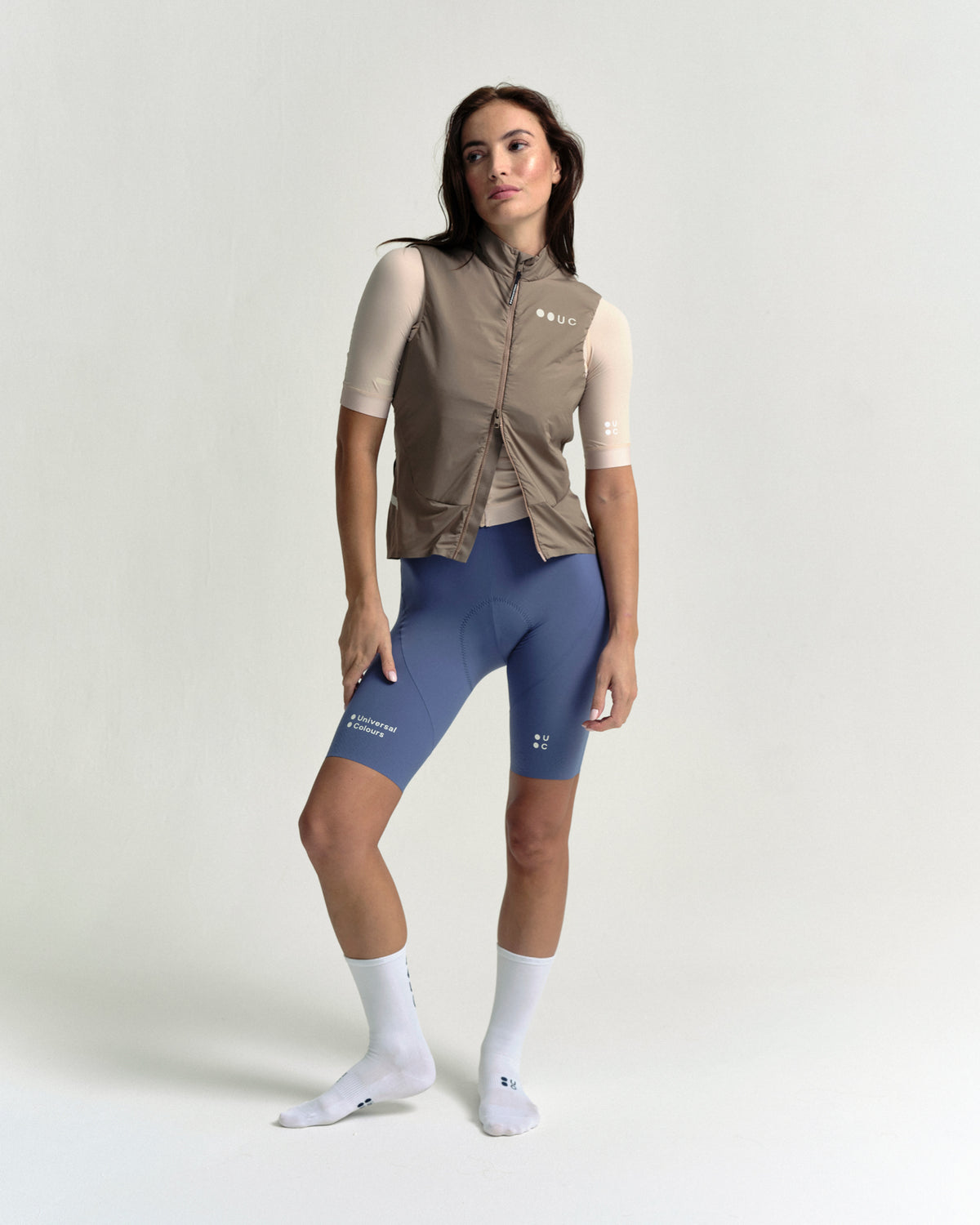 Model wearing the Women's Chroma Insulated Gilet in Walnut Brown.
